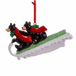 BLK BEAR COUPLE ON SLED ORN